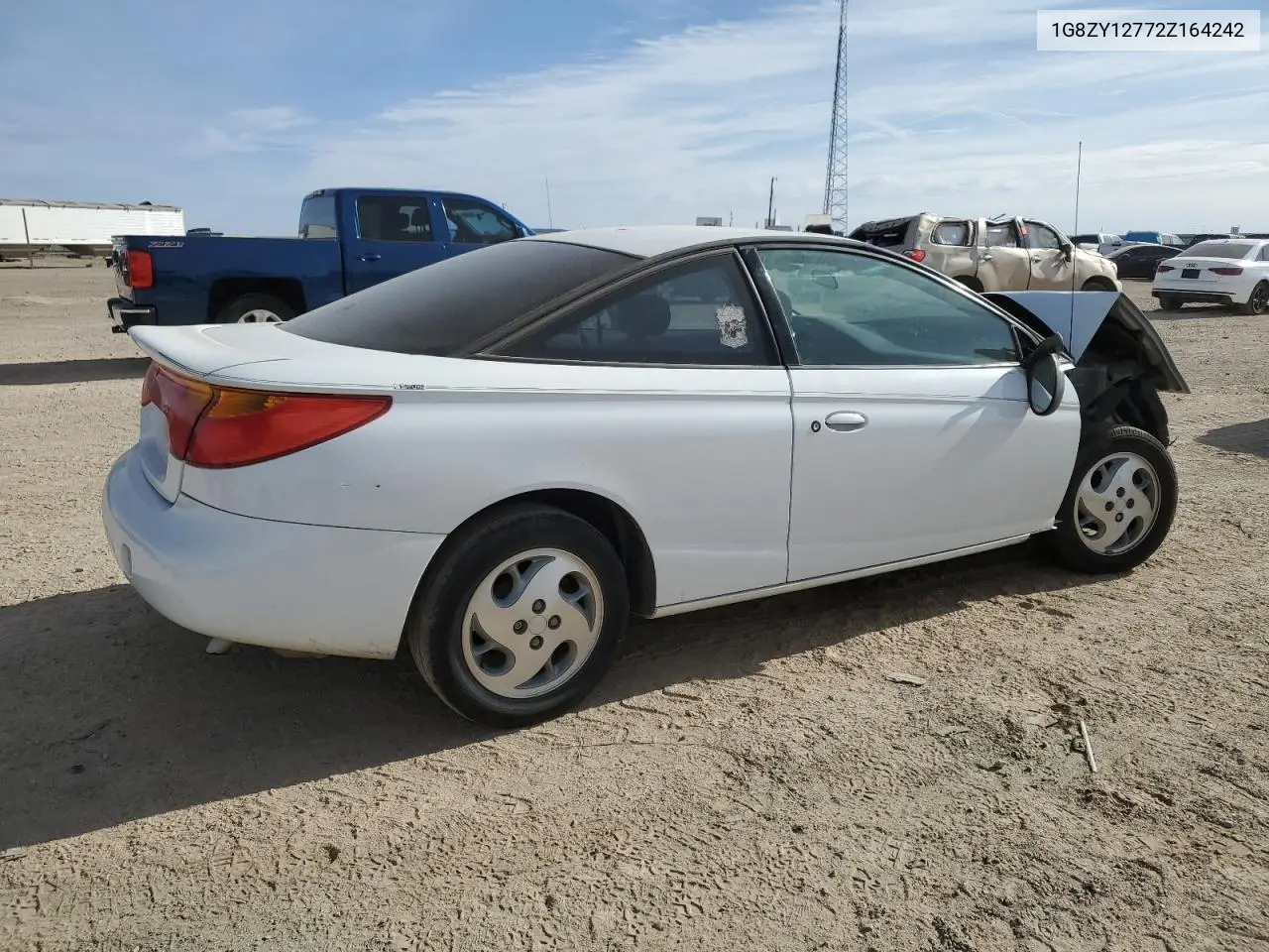 2002 Saturn Sc2 VIN: 1G8ZY12772Z164242 Lot: 46911695
