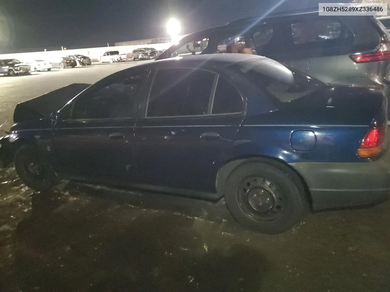 1999 Saturn Sl1 VIN: 1G8ZH5289XZ336486 Lot: 83240394
