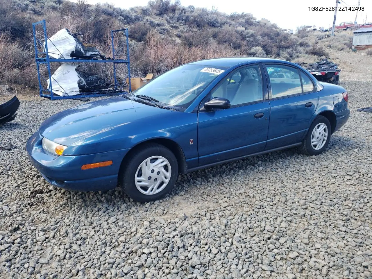 2002 Saturn Sl VIN: 1G8ZF52812Z142498 Lot: 48753605