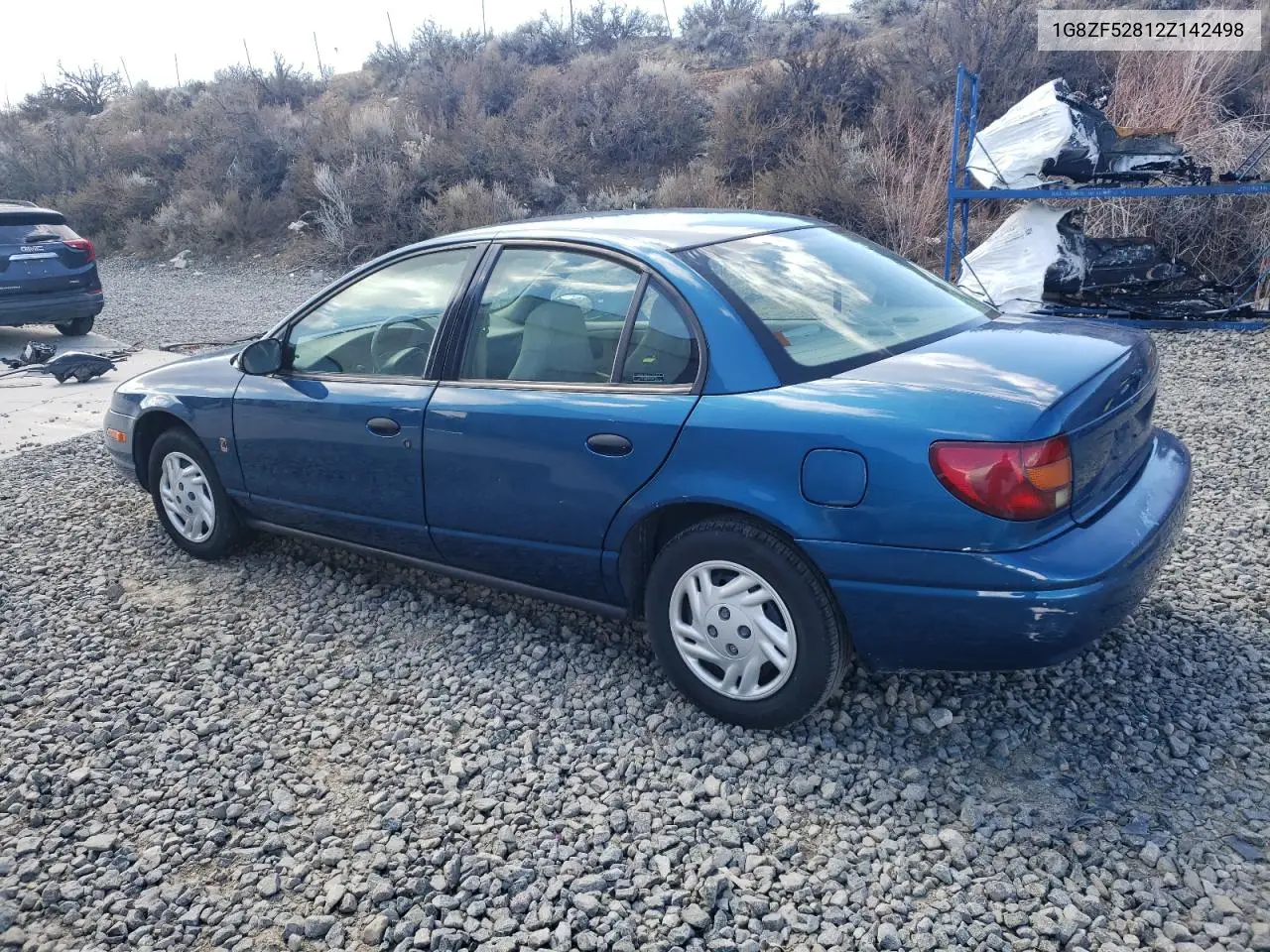 2002 Saturn Sl VIN: 1G8ZF52812Z142498 Lot: 48753605