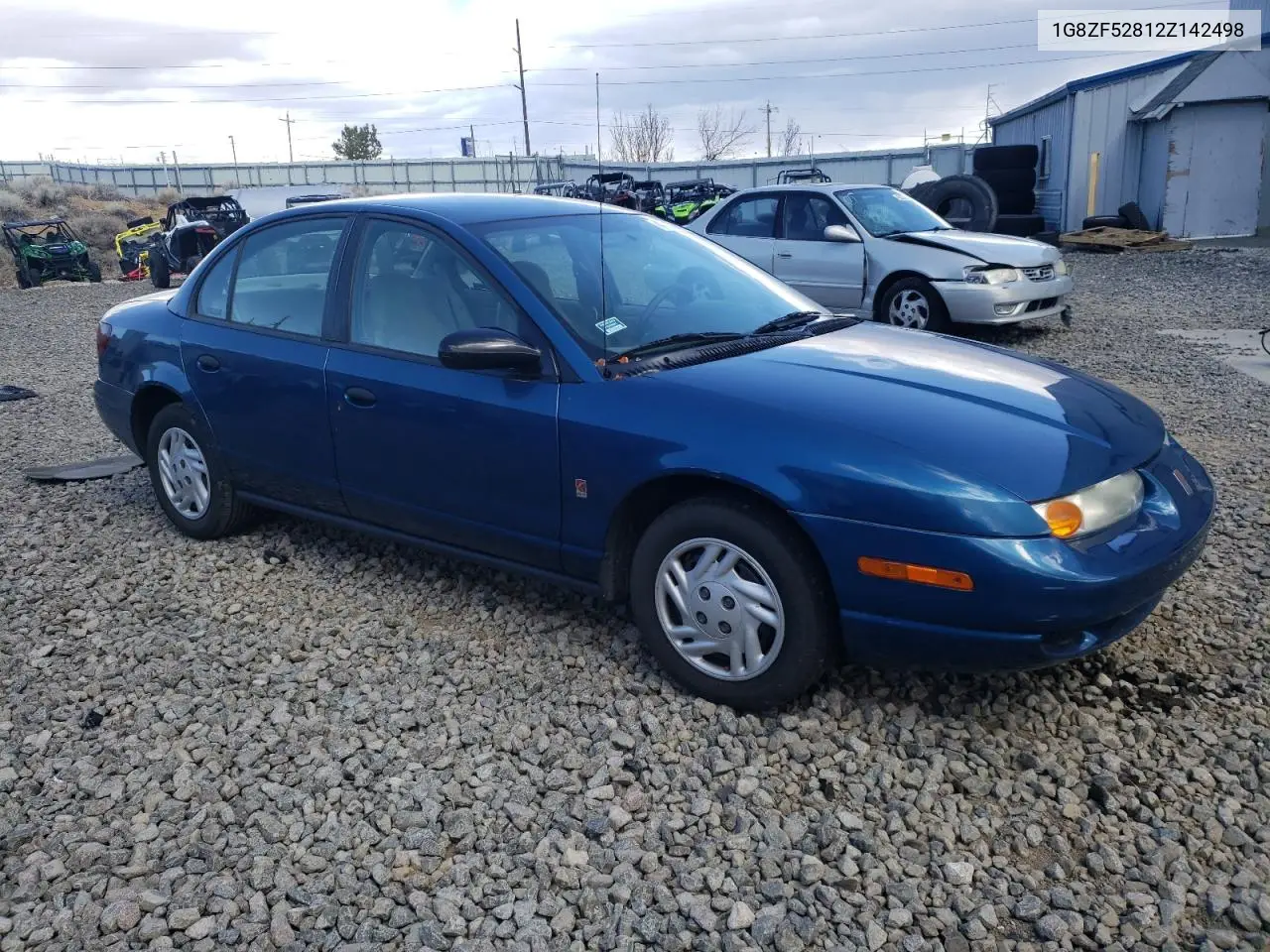 2002 Saturn Sl VIN: 1G8ZF52812Z142498 Lot: 48753605