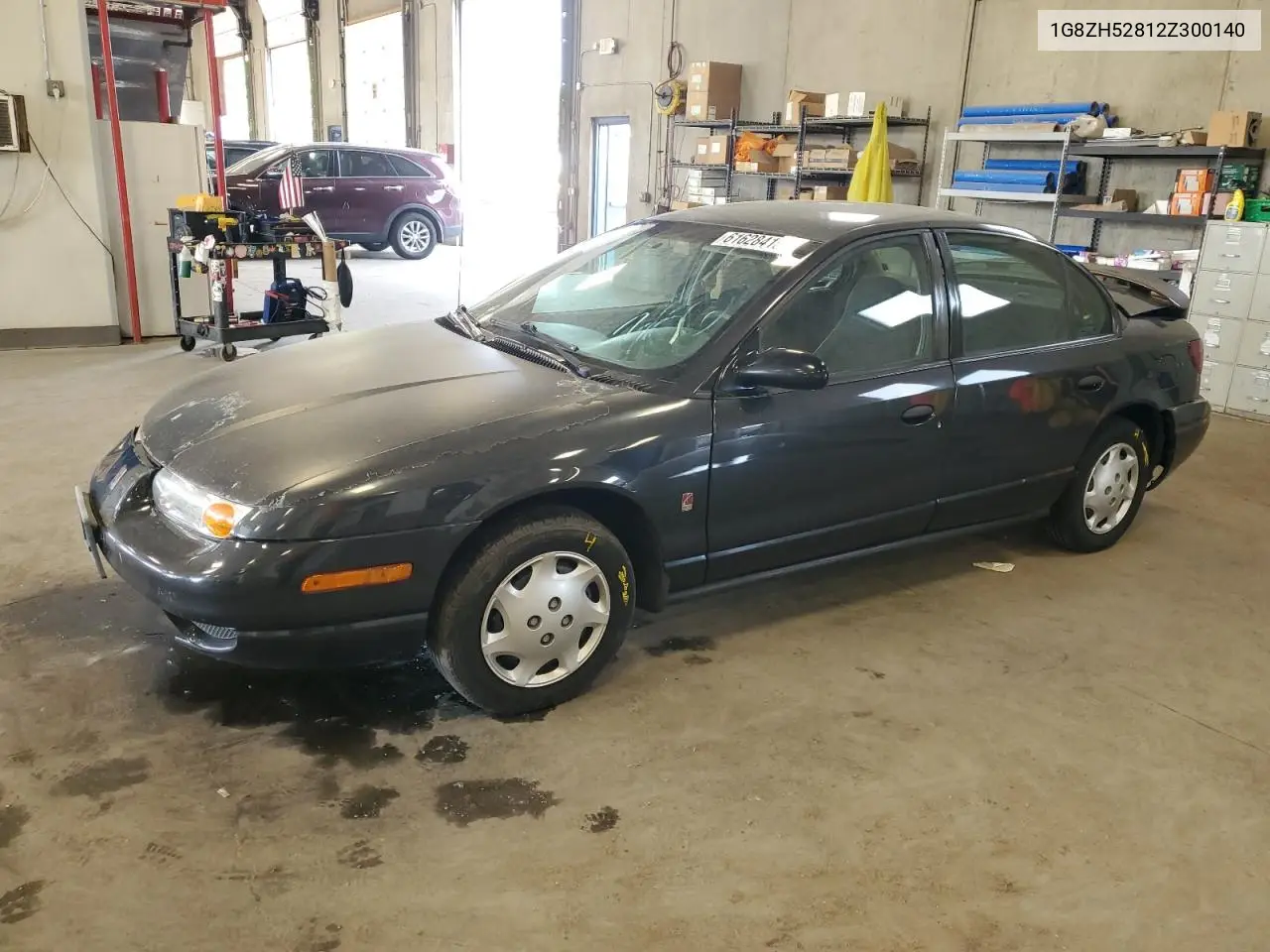 2002 Saturn Sl1 VIN: 1G8ZH52812Z300140 Lot: 61628415