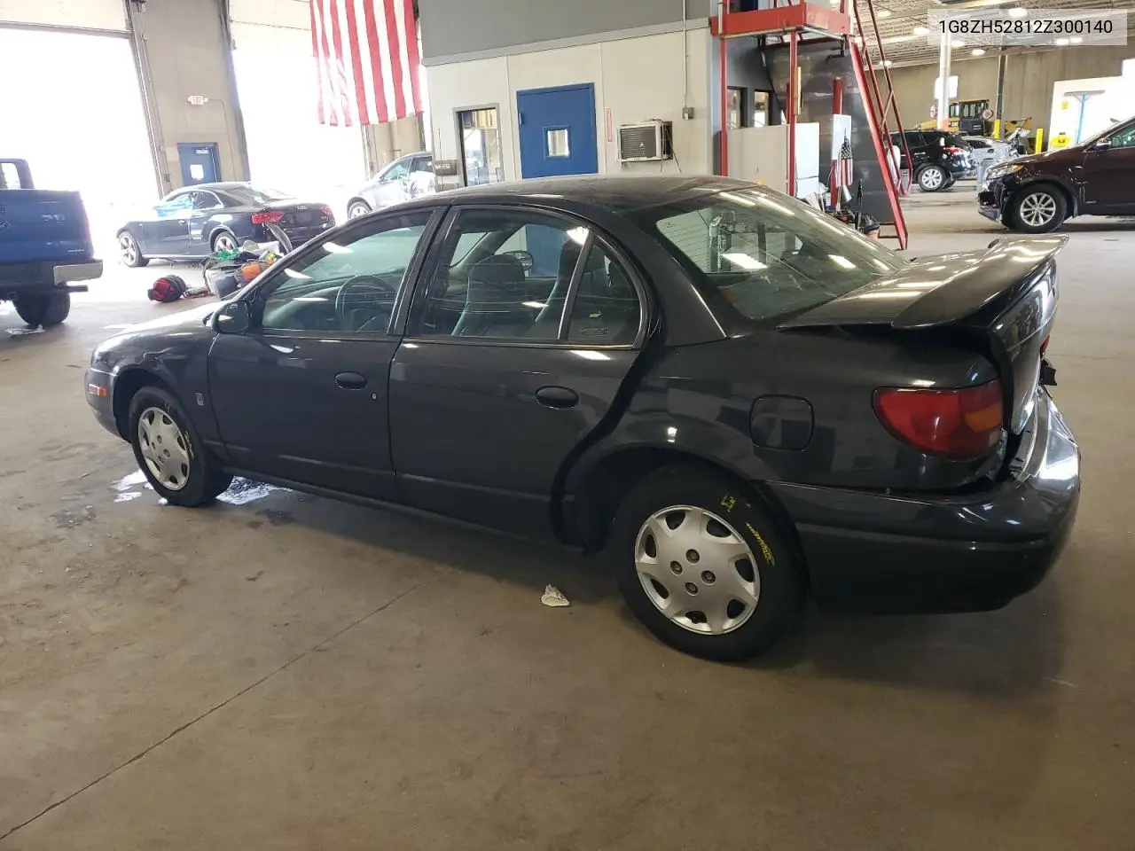 2002 Saturn Sl1 VIN: 1G8ZH52812Z300140 Lot: 61628415