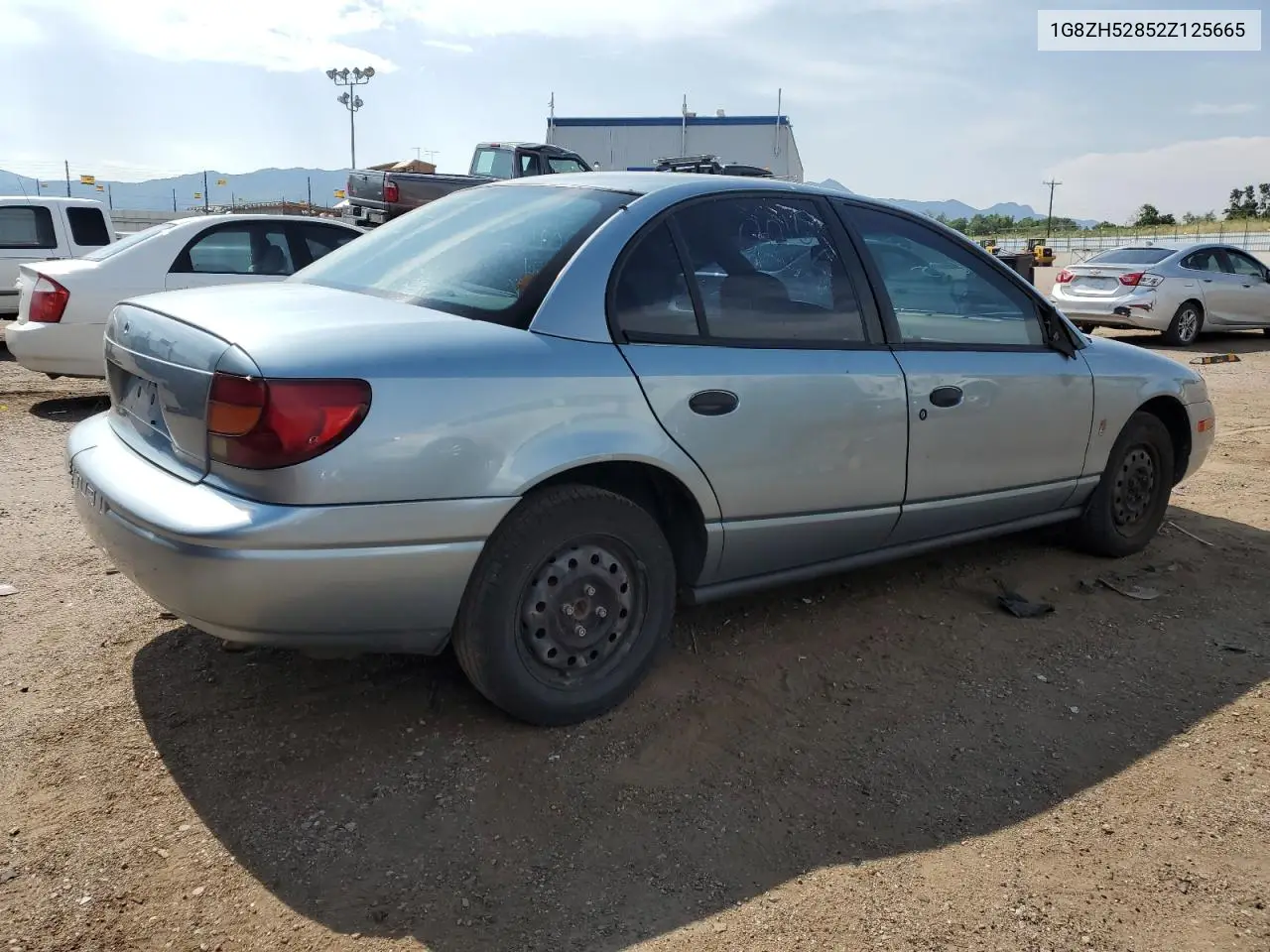 2002 Saturn Sl1 VIN: 1G8ZH52852Z125665 Lot: 64182705
