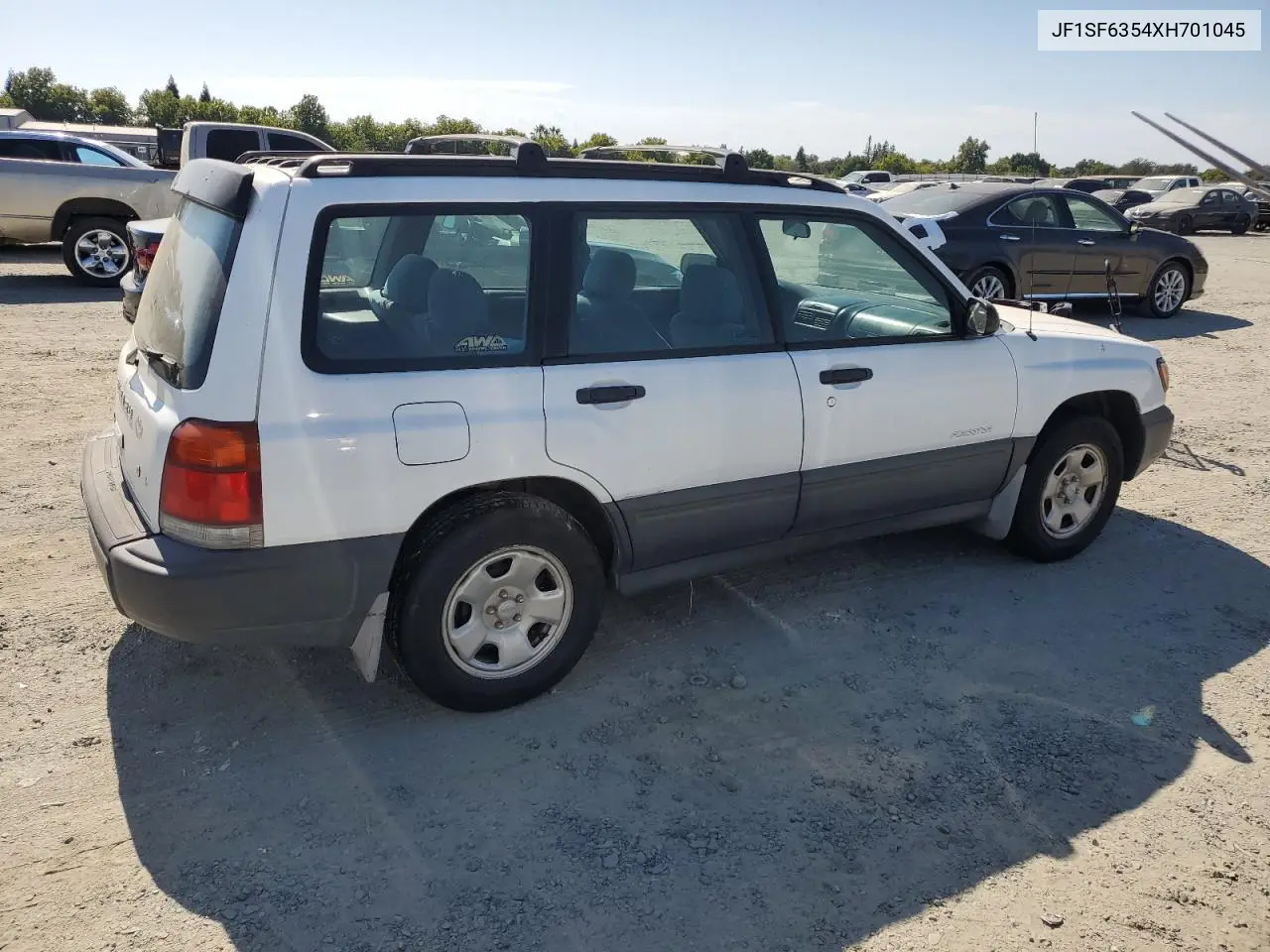 1999 Subaru Forester L VIN: JF1SF6354XH701045 Lot: 63166605
