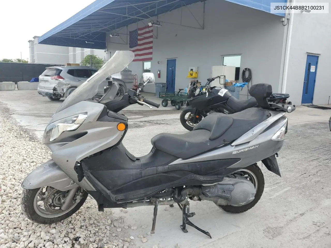 2011 Suzuki An400 A VIN: JS1CK44B8B2100231 Lot: 64110655