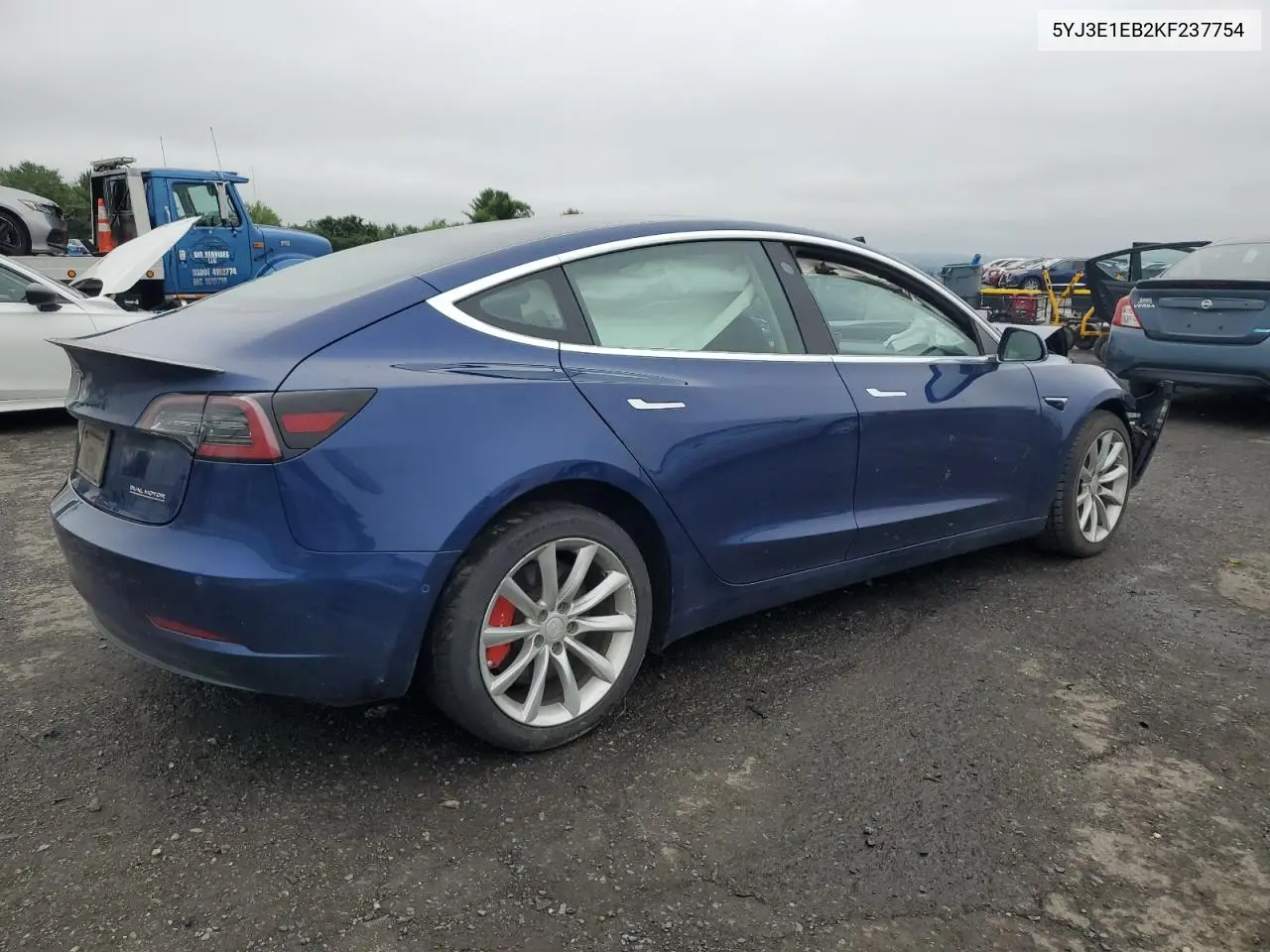2019 Tesla Model 3 VIN: 5YJ3E1EB2KF237754 Lot: 61087695