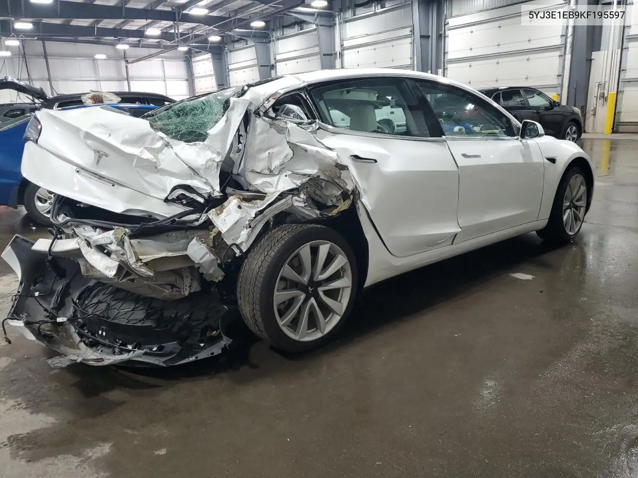 2019 Tesla Model 3 VIN: 5YJ3E1EB9KF195597 Lot: 61576395