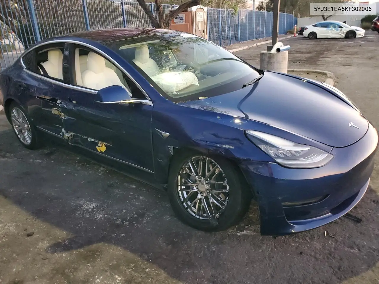 2019 Tesla Model 3 VIN: 5YJ3E1EA5KF302006 Lot: 63152965