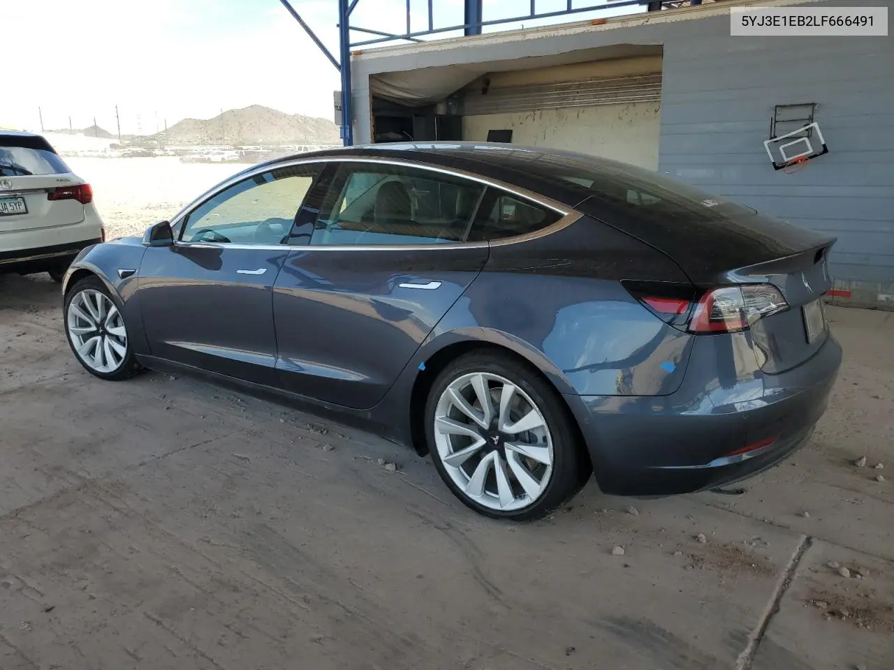 2020 Tesla Model 3 VIN: 5YJ3E1EB2LF666491 Lot: 63336915