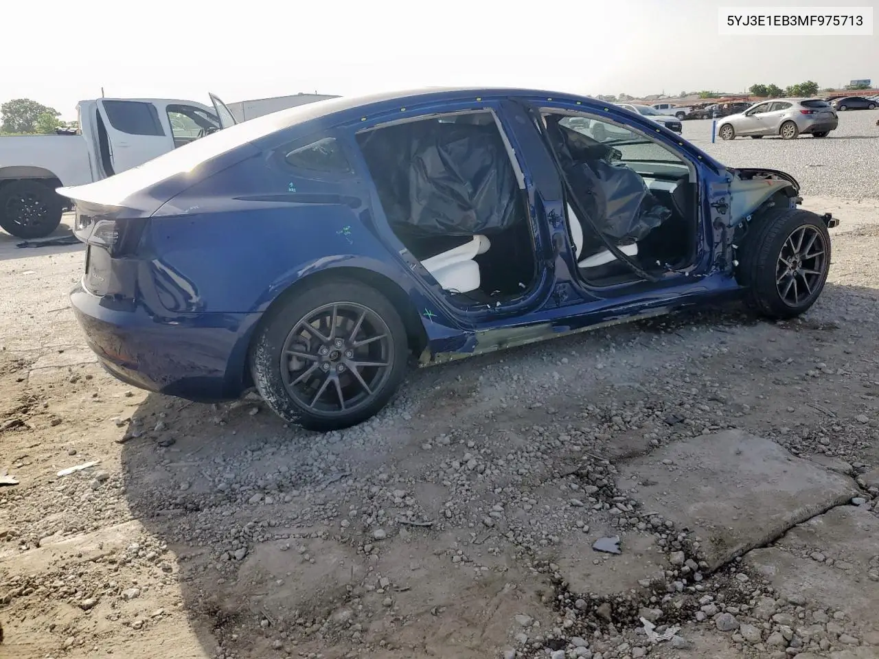2021 Tesla Model 3 VIN: 5YJ3E1EB3MF975713 Lot: 56130315