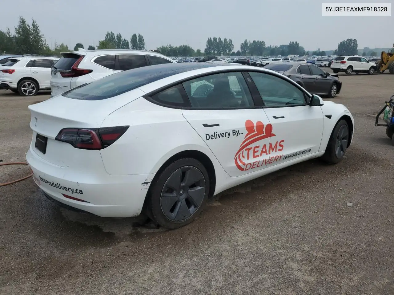 2021 Tesla Model 3 VIN: 5YJ3E1EAXMF918528 Lot: 64302165