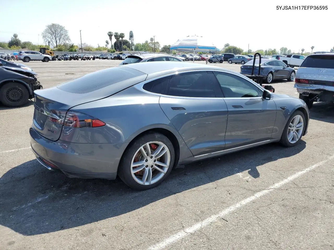 2014 Tesla Model S VIN: 5YJSA1H17EFP36595 Lot: 53705035