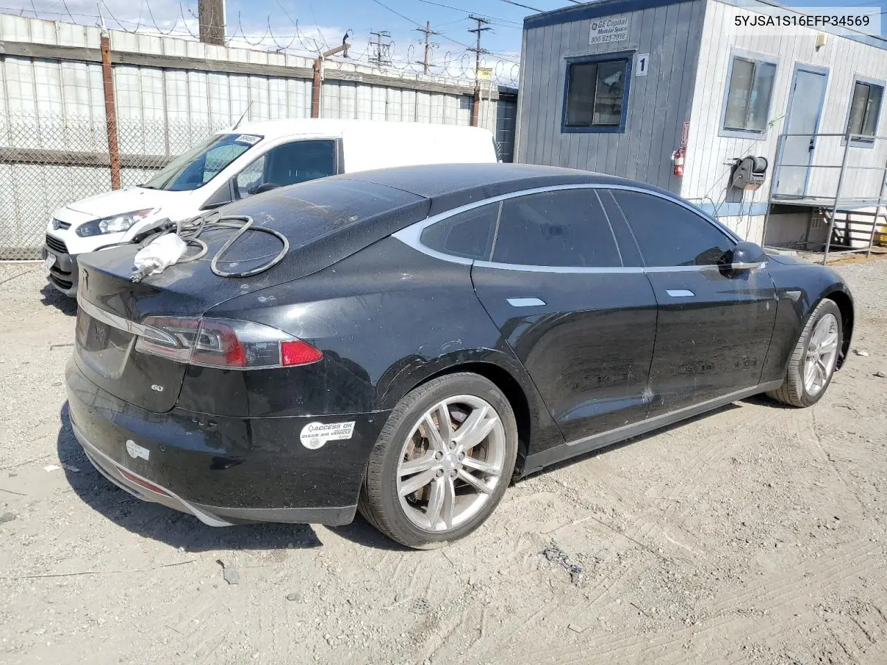 2014 Tesla Model S VIN: 5YJSA1S16EFP34569 Lot: 56563375