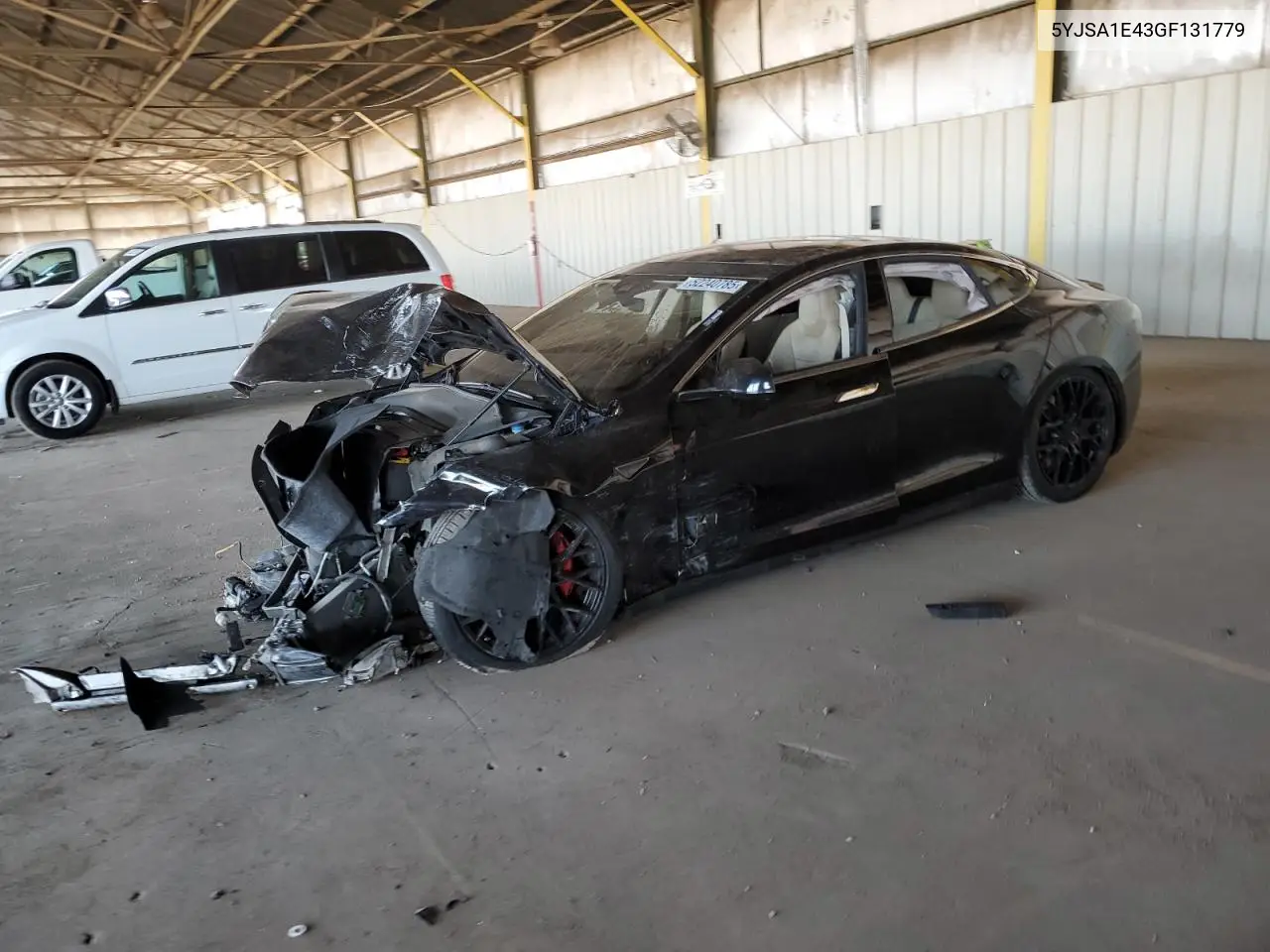 2016 Tesla Model S VIN: 5YJSA1E43GF131779 Lot: 52240785