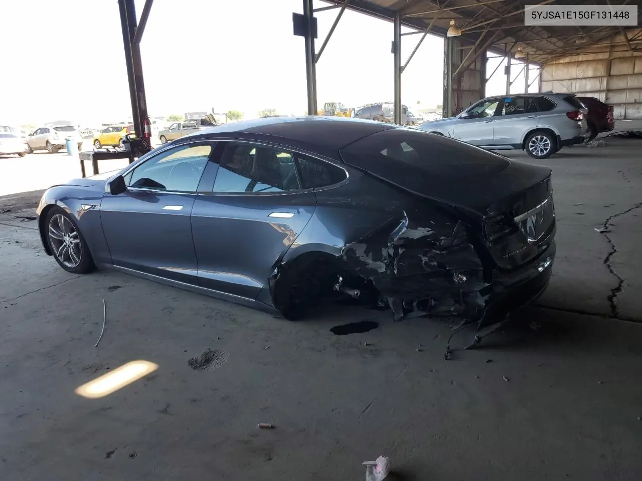 2016 Tesla Model S VIN: 5YJSA1E15GF131448 Lot: 57100245