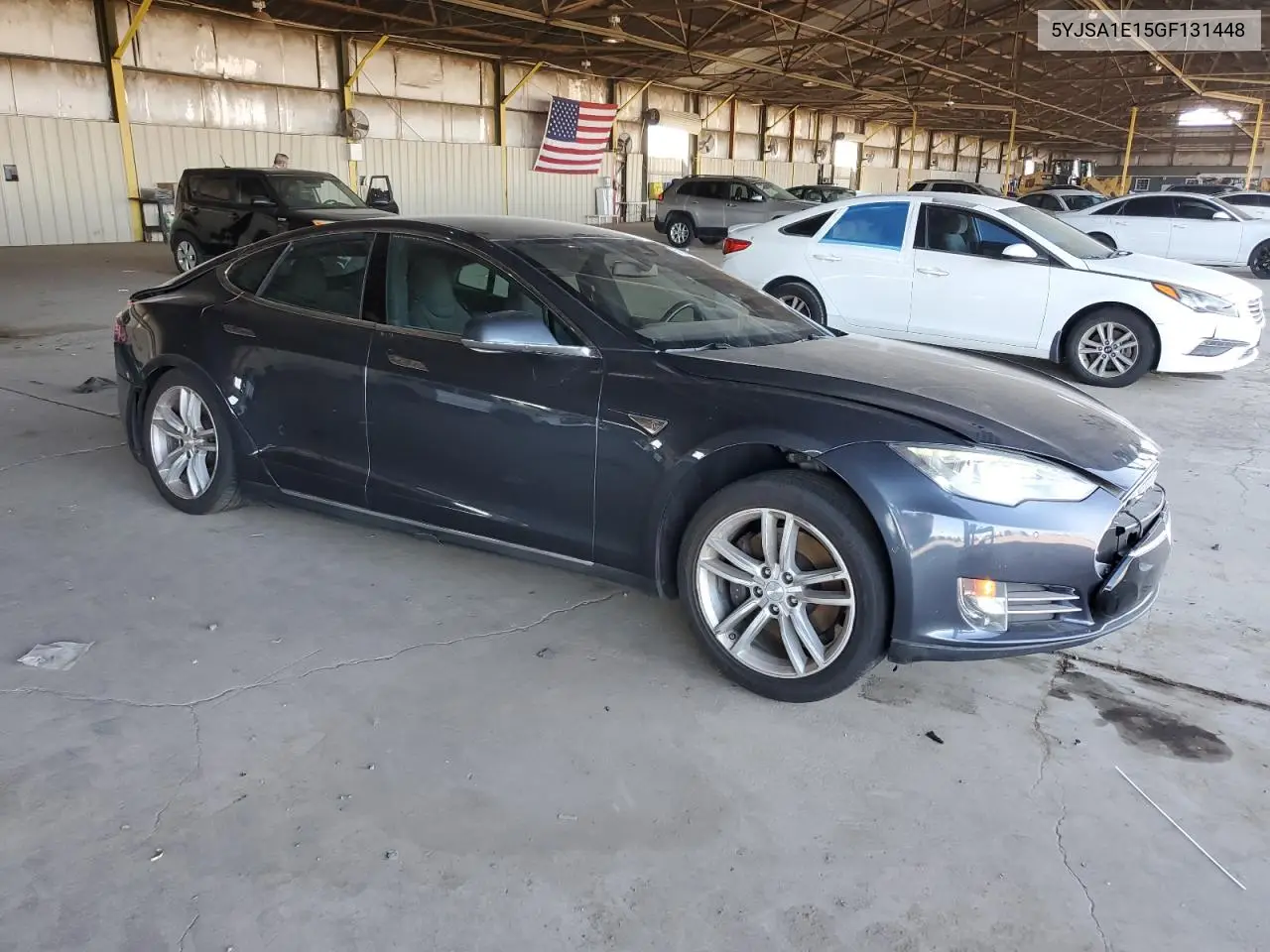 2016 Tesla Model S VIN: 5YJSA1E15GF131448 Lot: 57100245