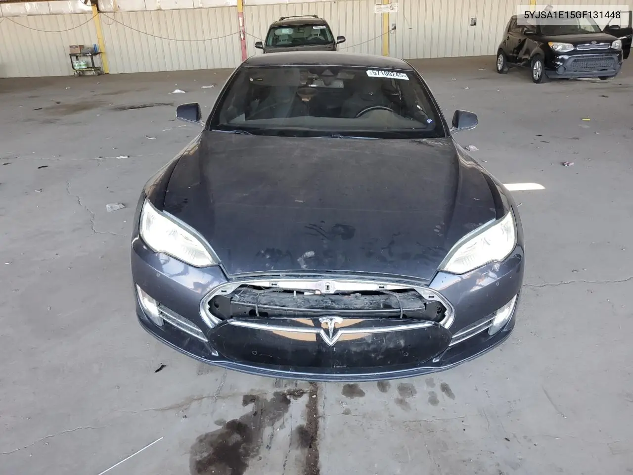 2016 Tesla Model S VIN: 5YJSA1E15GF131448 Lot: 57100245