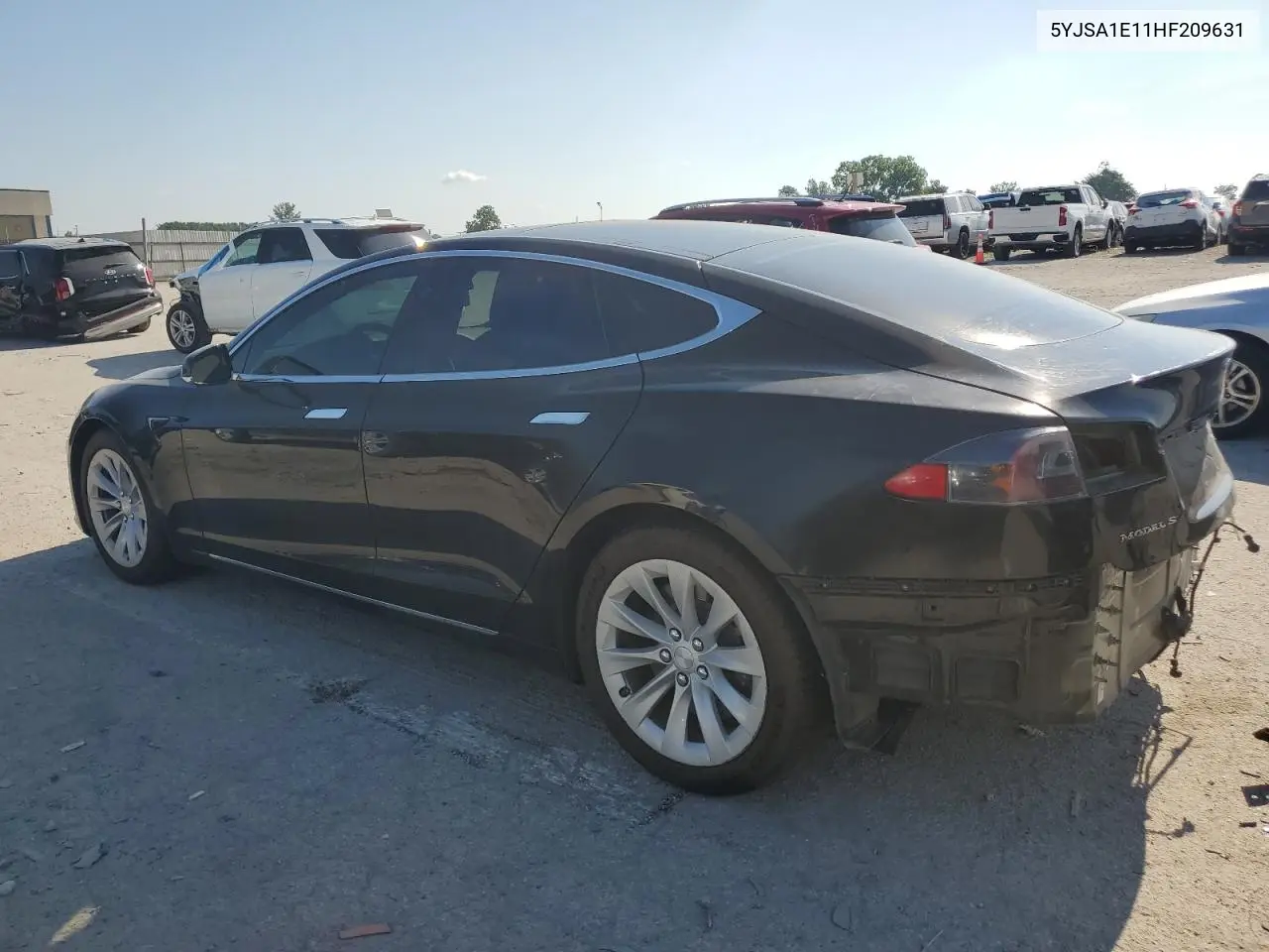 2017 Tesla Model S VIN: 5YJSA1E11HF209631 Lot: 61384575