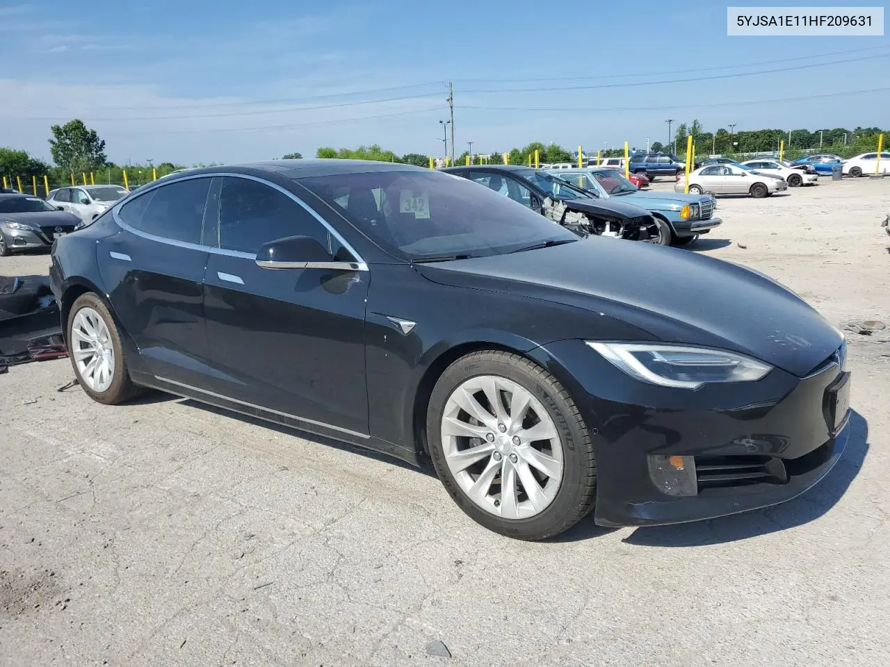 2017 Tesla Model S VIN: 5YJSA1E11HF209631 Lot: 61384575