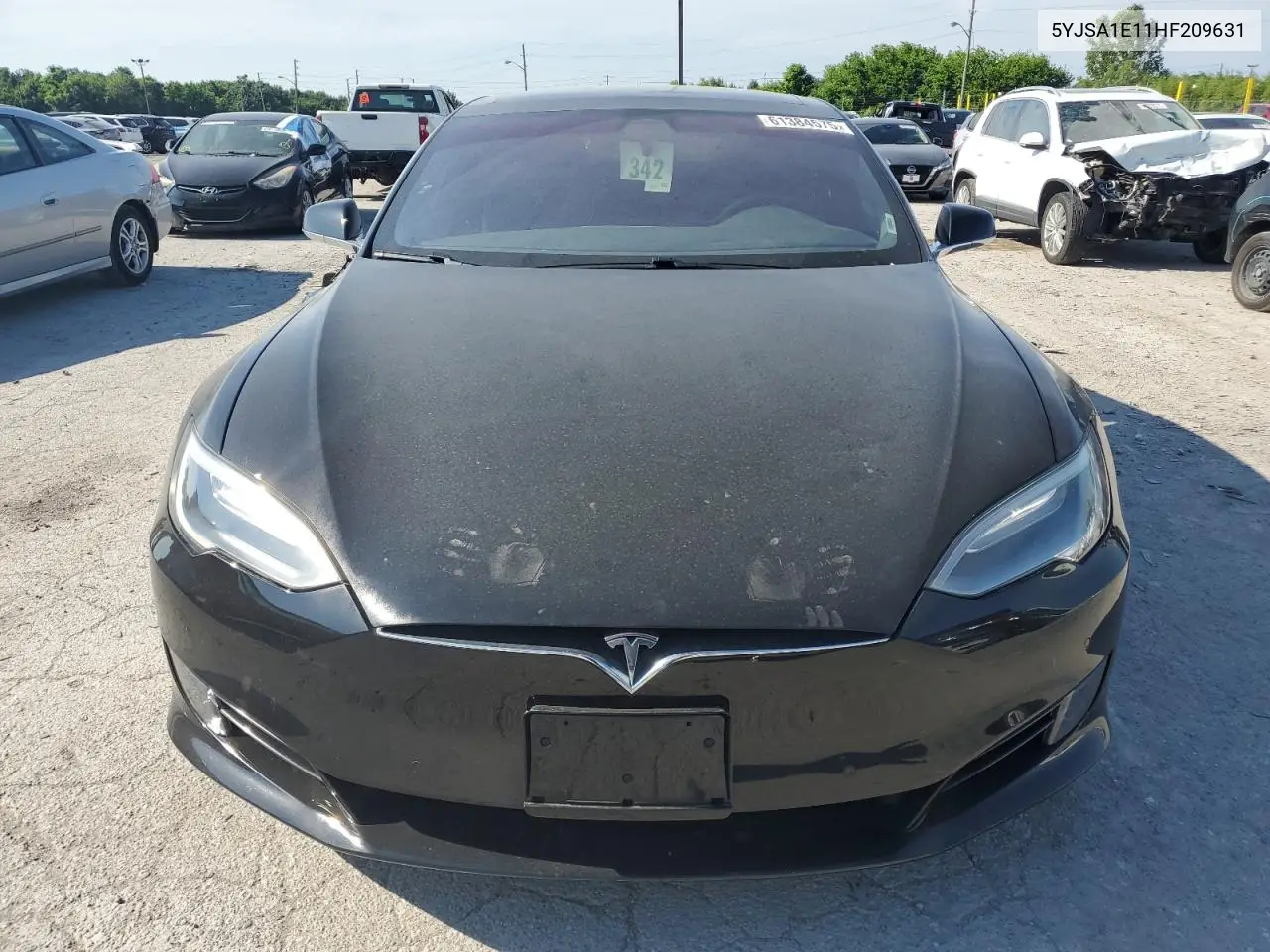 2017 Tesla Model S VIN: 5YJSA1E11HF209631 Lot: 61384575