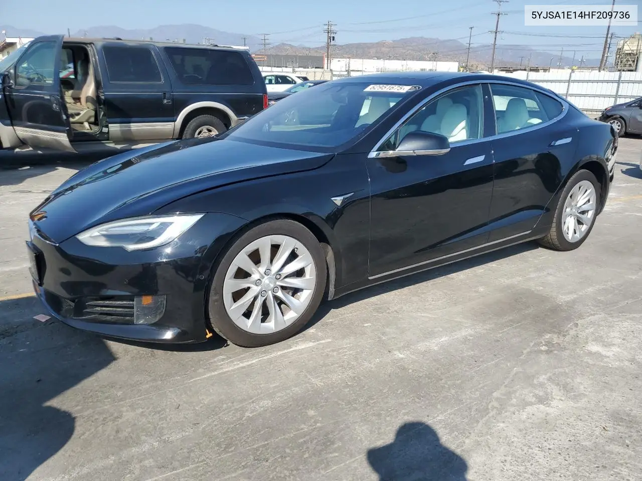 2017 Tesla Model S VIN: 5YJSA1E14HF209736 Lot: 62951675