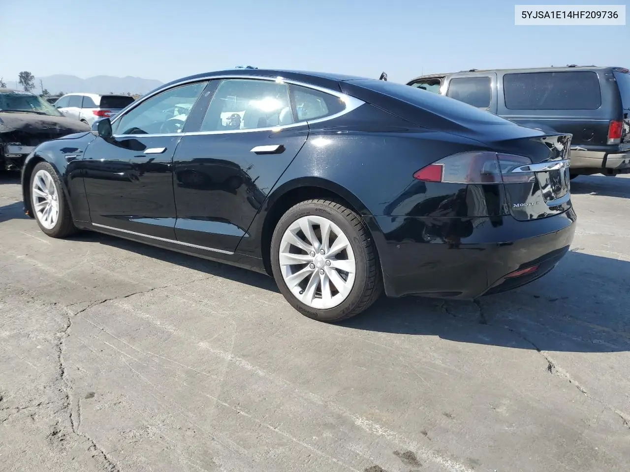 2017 Tesla Model S VIN: 5YJSA1E14HF209736 Lot: 62951675