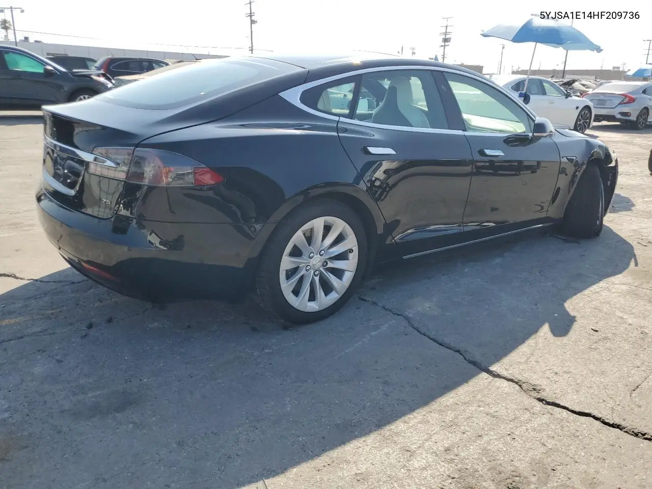 2017 Tesla Model S VIN: 5YJSA1E14HF209736 Lot: 62951675