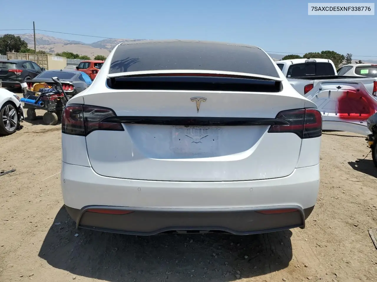 2022 Tesla Model X VIN: 7SAXCDE5XNF338776 Lot: 61865365
