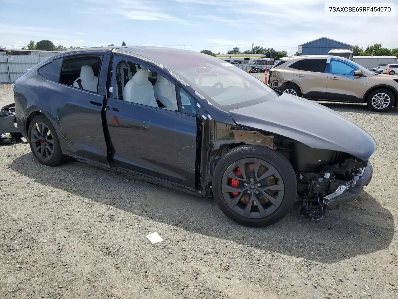 2024 Tesla Model X VIN: 7SAXCBE69RF454070 Lot: 56875585