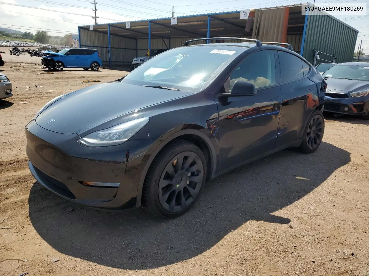 2021 Tesla Model Y VIN: 5YJYGAEE9MF180269 Lot: 63075815