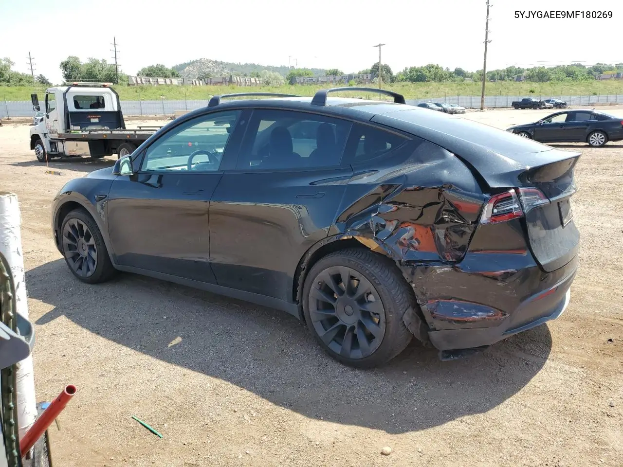 2021 Tesla Model Y VIN: 5YJYGAEE9MF180269 Lot: 63075815