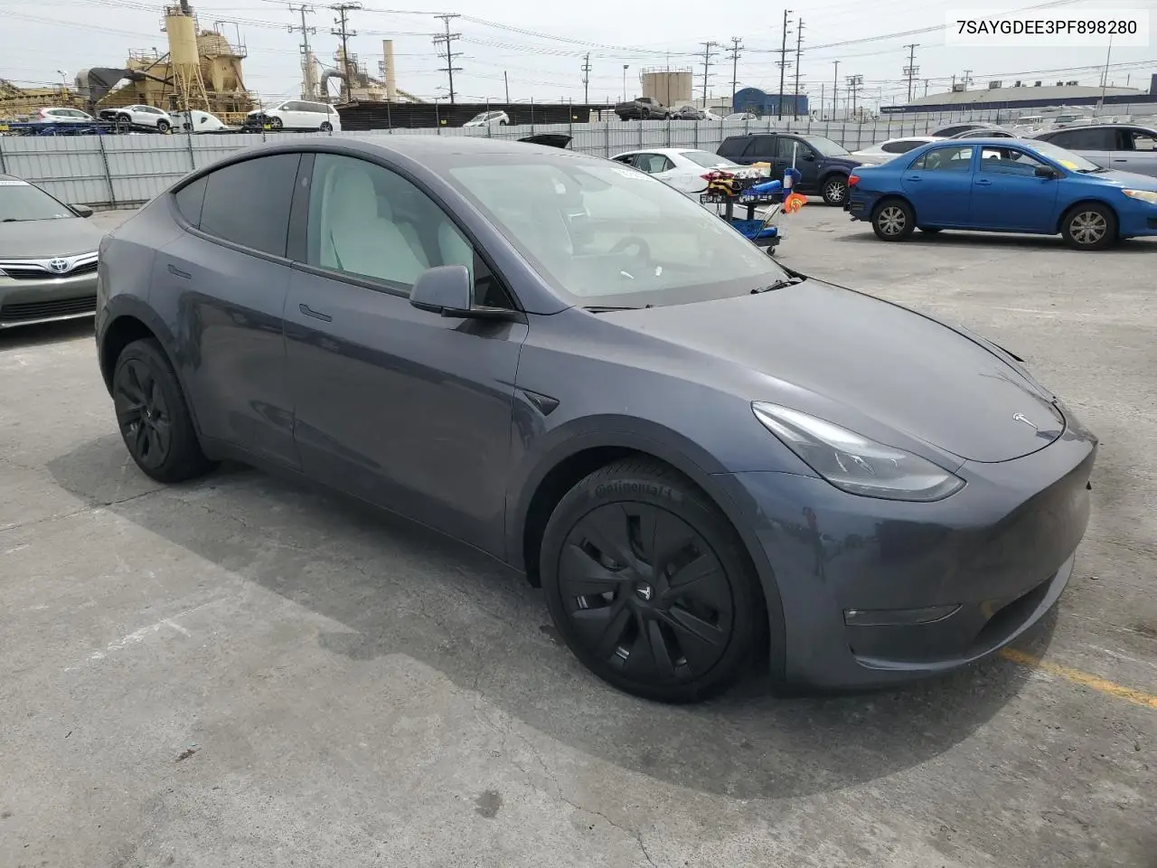 2023 Tesla Model Y VIN: 7SAYGDEE3PF898280 Lot: 56758725