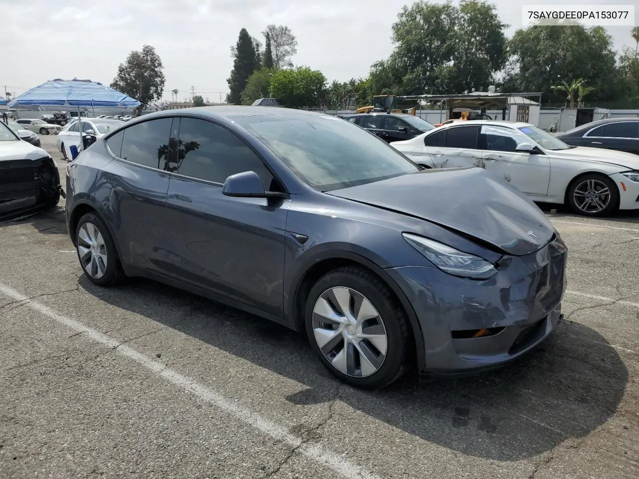 2023 Tesla Model Y VIN: 7SAYGDEE0PA153077 Lot: 58527055