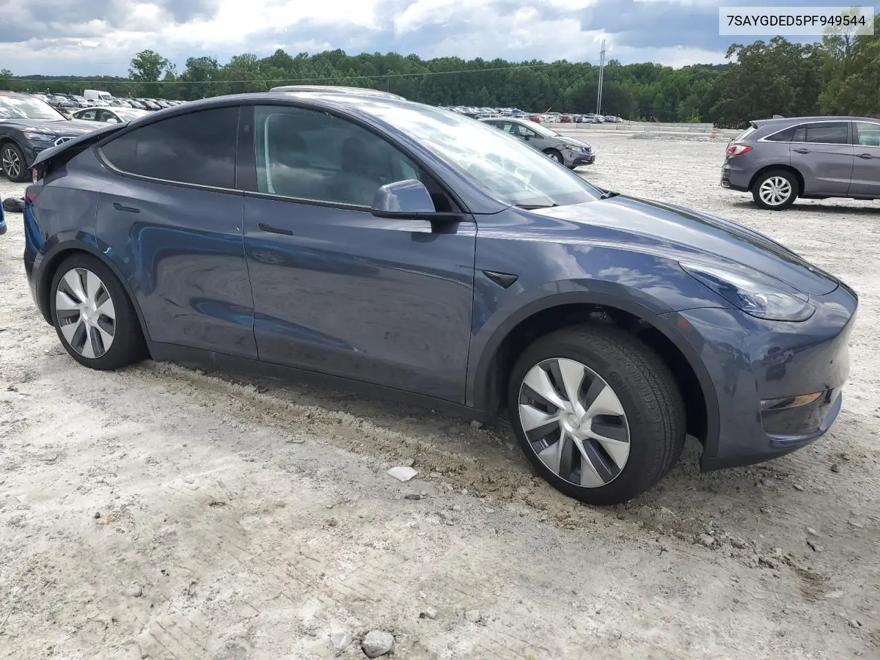 2023 Tesla Model Y VIN: 7SAYGDED5PF949544 Lot: 60210925
