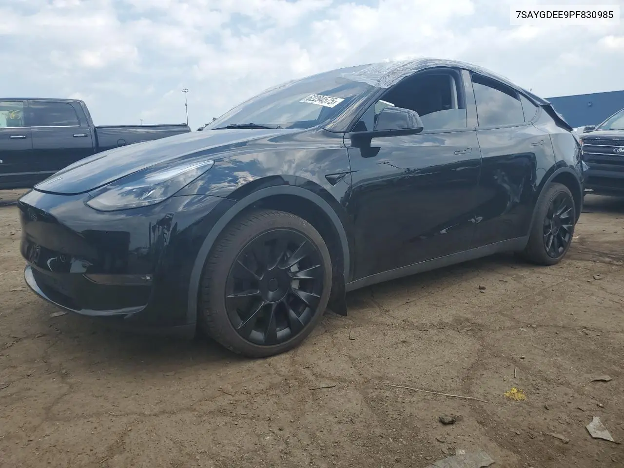 2023 Tesla Model Y VIN: 7SAYGDEE9PF830985 Lot: 62294575