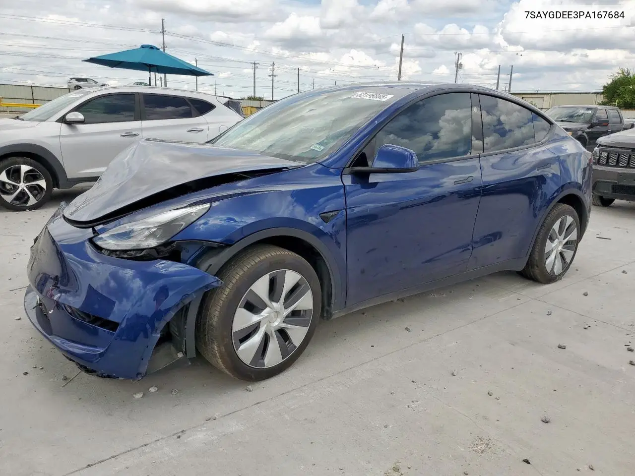 2023 Tesla Model Y VIN: 7SAYGDEE3PA167684 Lot: 63126885