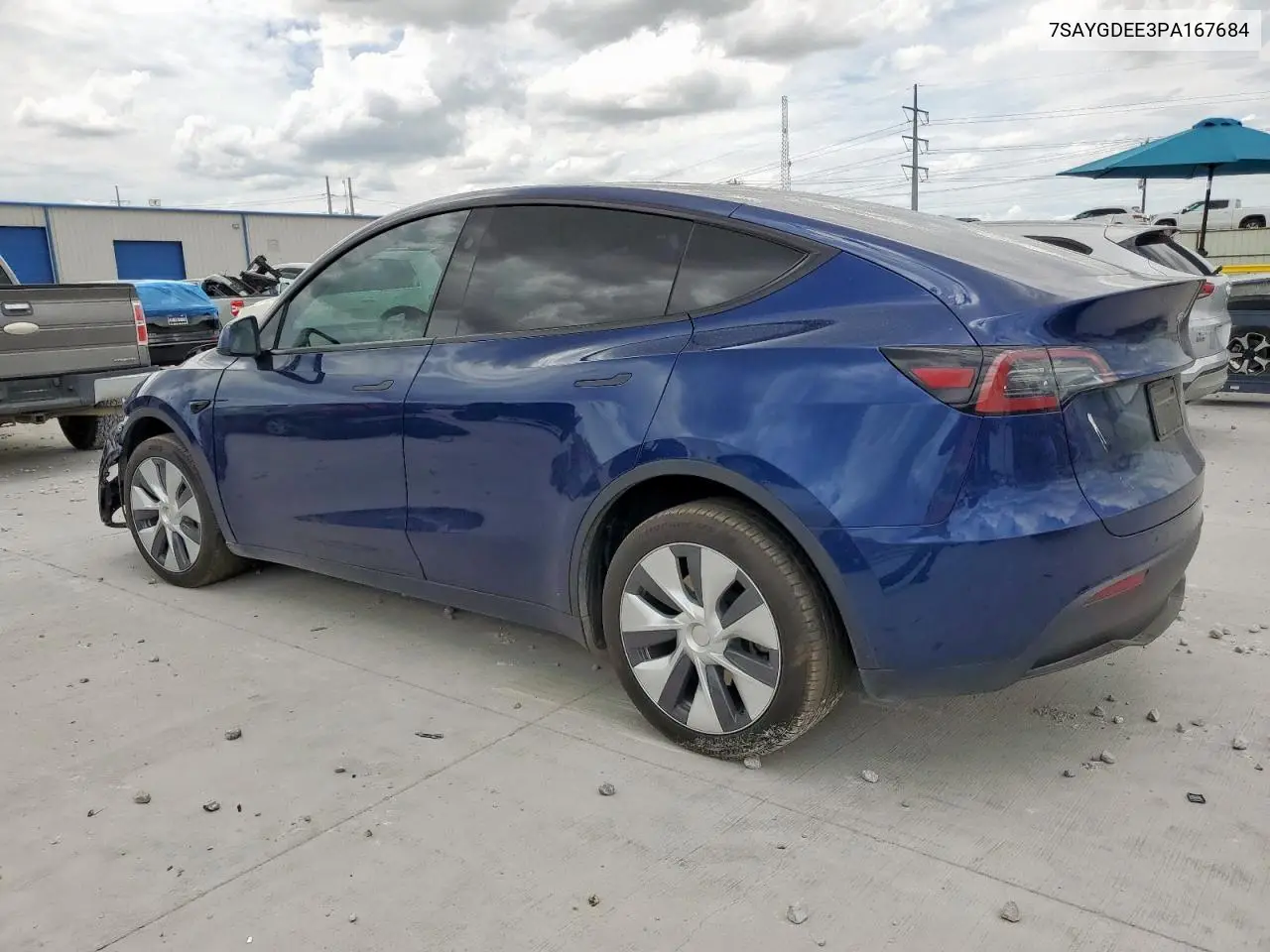 2023 Tesla Model Y VIN: 7SAYGDEE3PA167684 Lot: 63126885