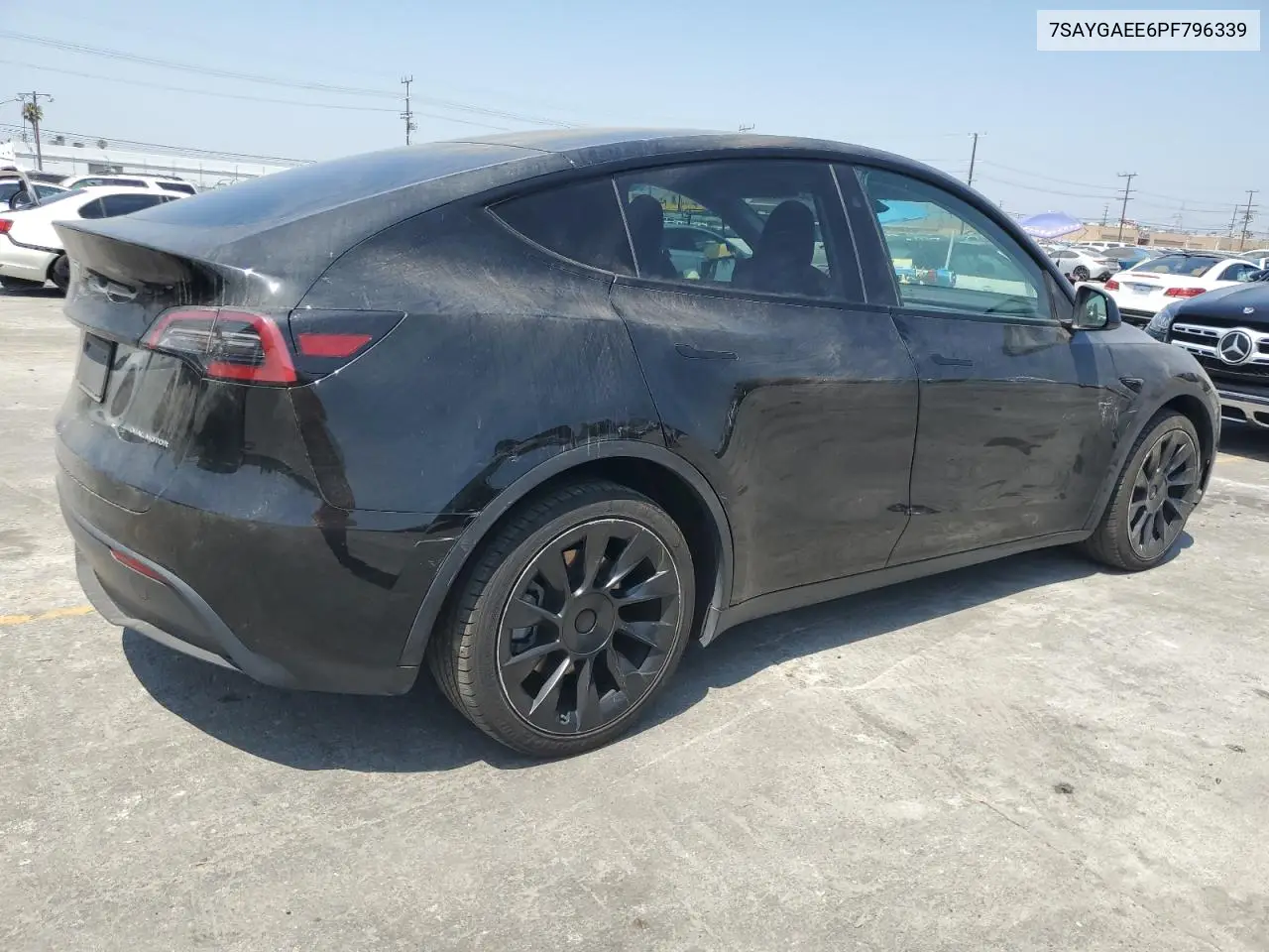 2023 Tesla Model Y VIN: 7SAYGAEE6PF796339 Lot: 63155255