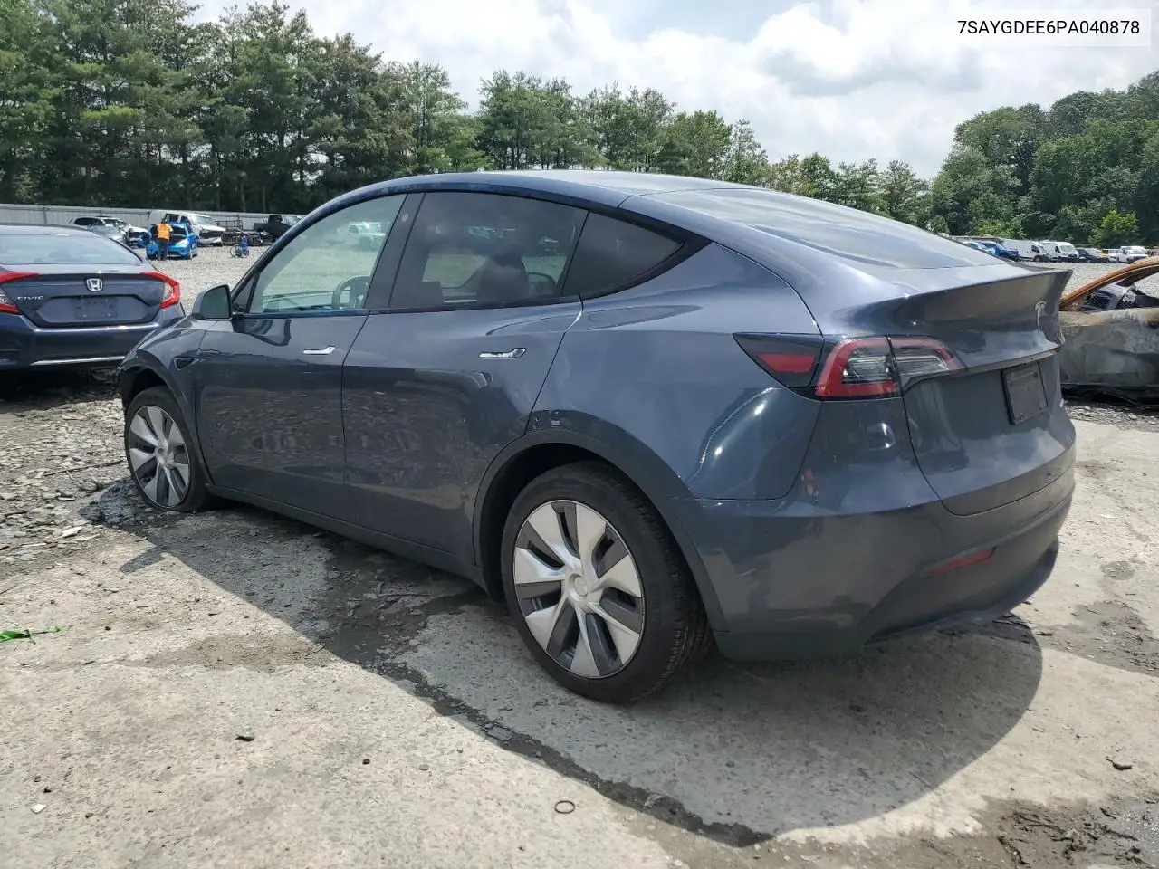 2023 Tesla Model Y VIN: 7SAYGDEE6PA040878 Lot: 63411635
