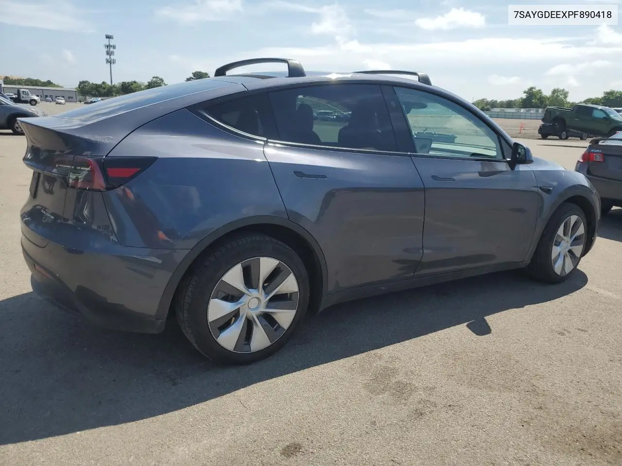 2023 Tesla Model Y VIN: 7SAYGDEEXPF890418 Lot: 64557175