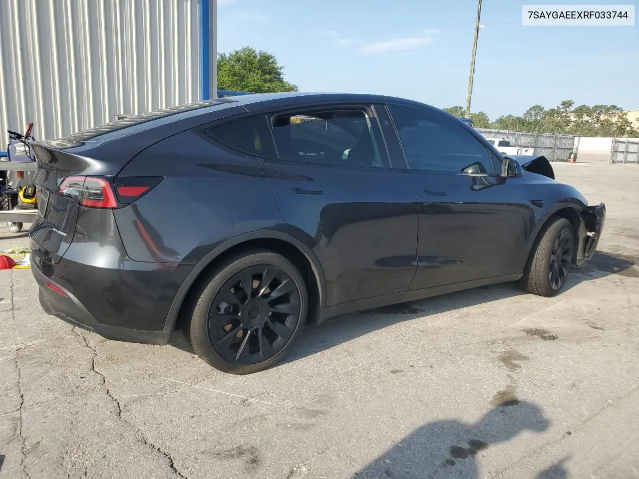 2024 Tesla Model Y VIN: 7SAYGAEEXRF033744 Lot: 58848275