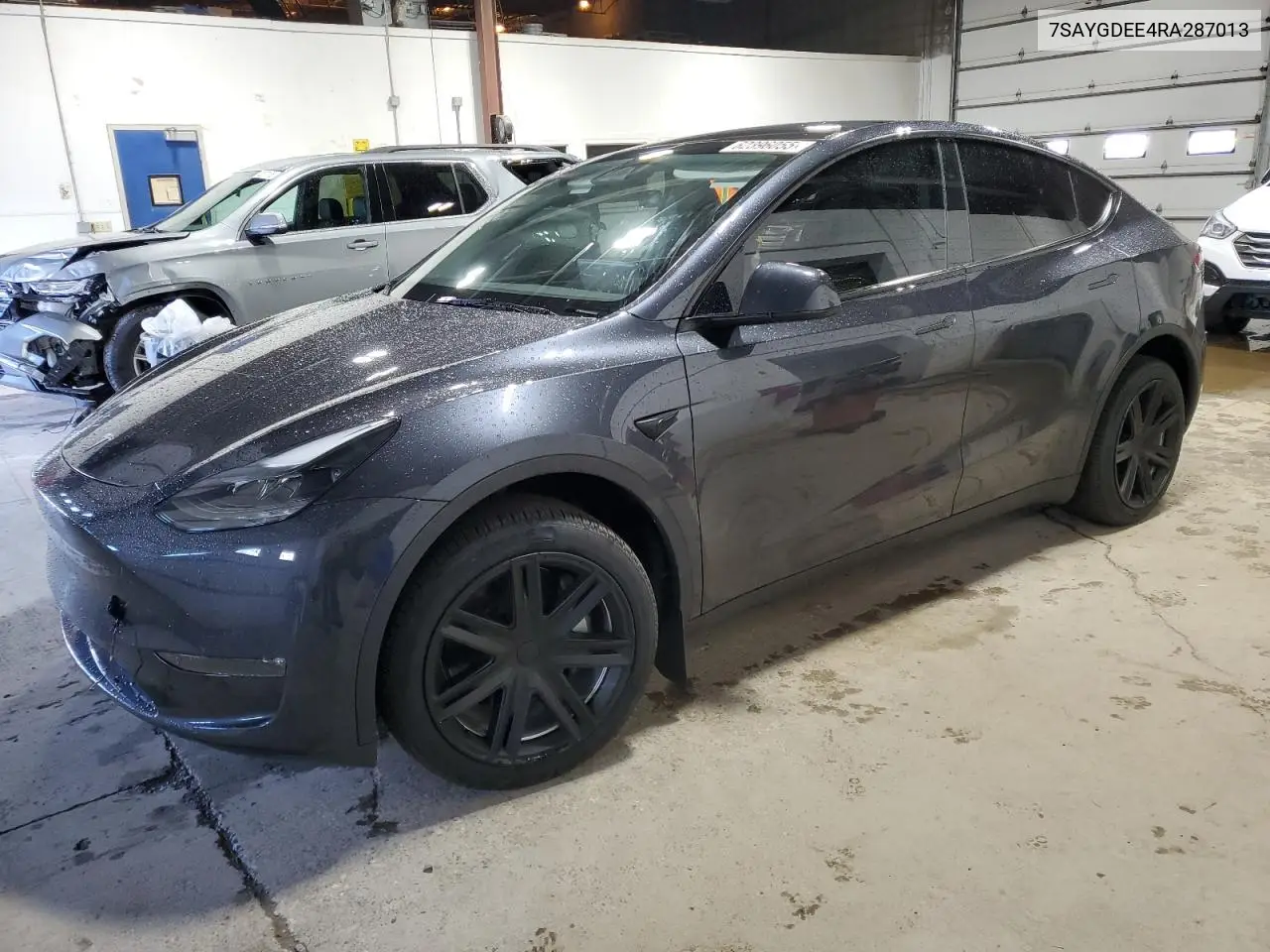 2024 Tesla Model Y VIN: 7SAYGDEE4RA287013 Lot: 62396055