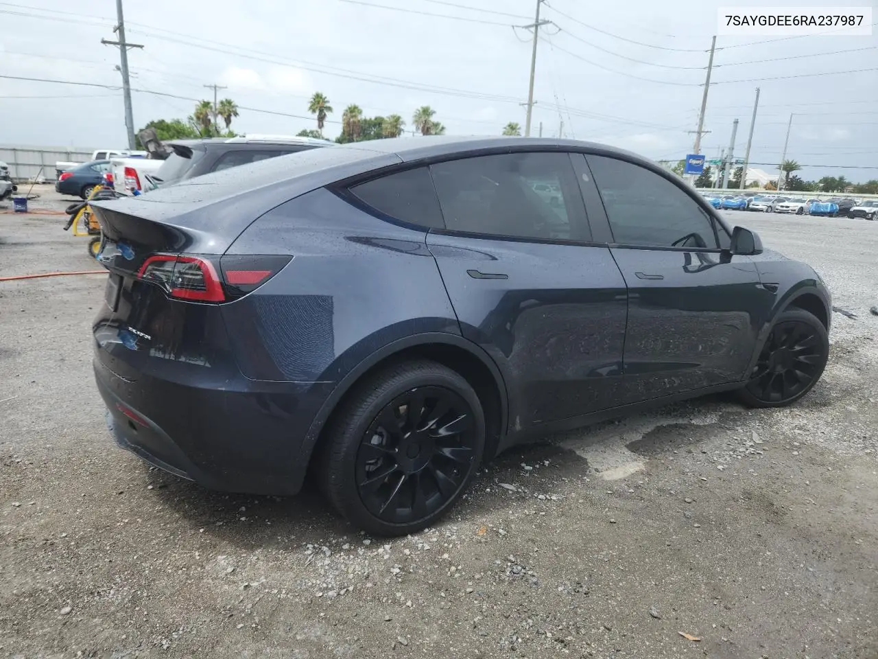 2024 Tesla Model Y VIN: 7SAYGDEE6RA237987 Lot: 63019505