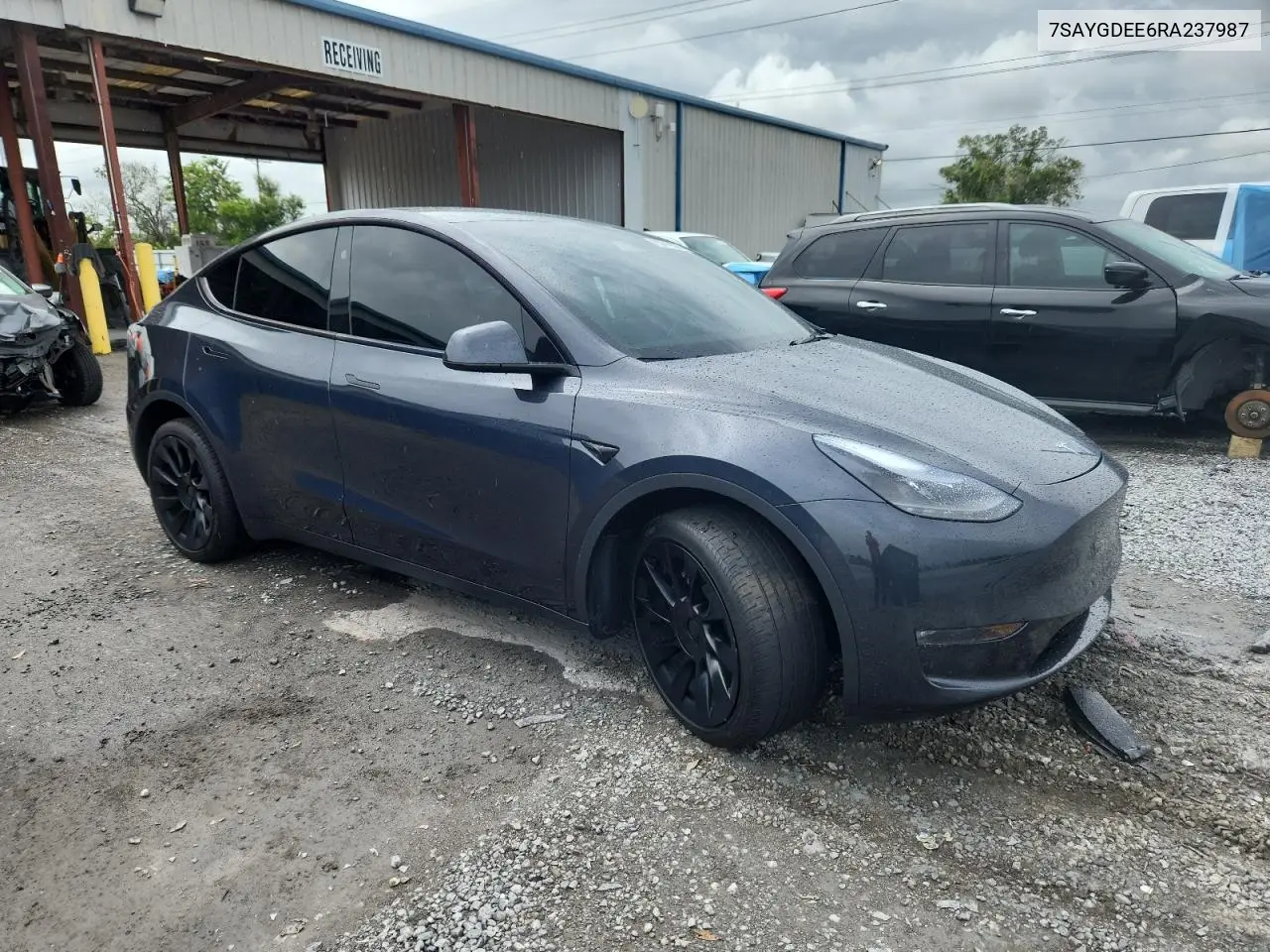 2024 Tesla Model Y VIN: 7SAYGDEE6RA237987 Lot: 63019505