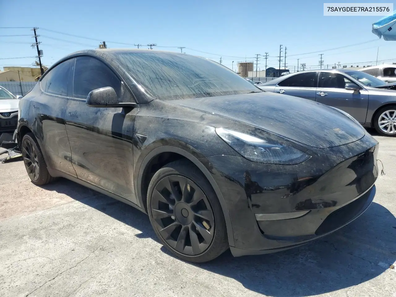 2024 Tesla Model Y VIN: 7SAYGDEE7RA215576 Lot: 63054895