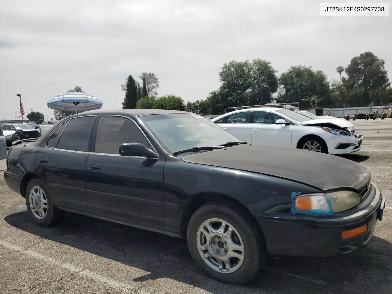 1995 Toyota Camry Le VIN: JT2SK12E4S0297738 Lot: 58627315