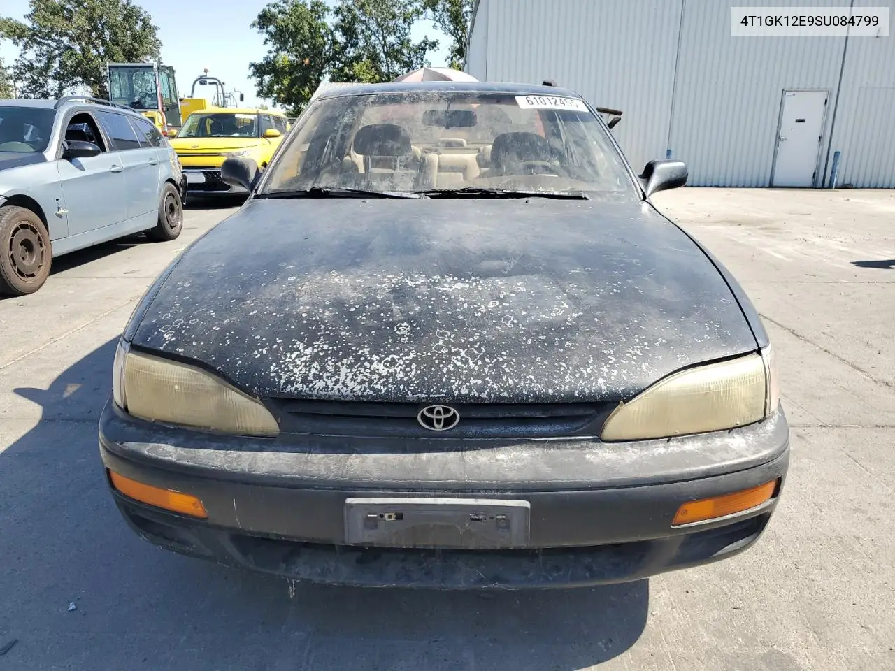 1995 Toyota Camry Le VIN: 4T1GK12E9SU084799 Lot: 61012455