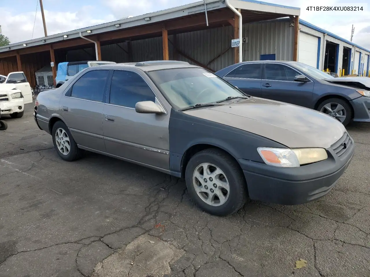 1999 Toyota Camry Le VIN: 4T1BF28K4XU083214 Lot: 62064965
