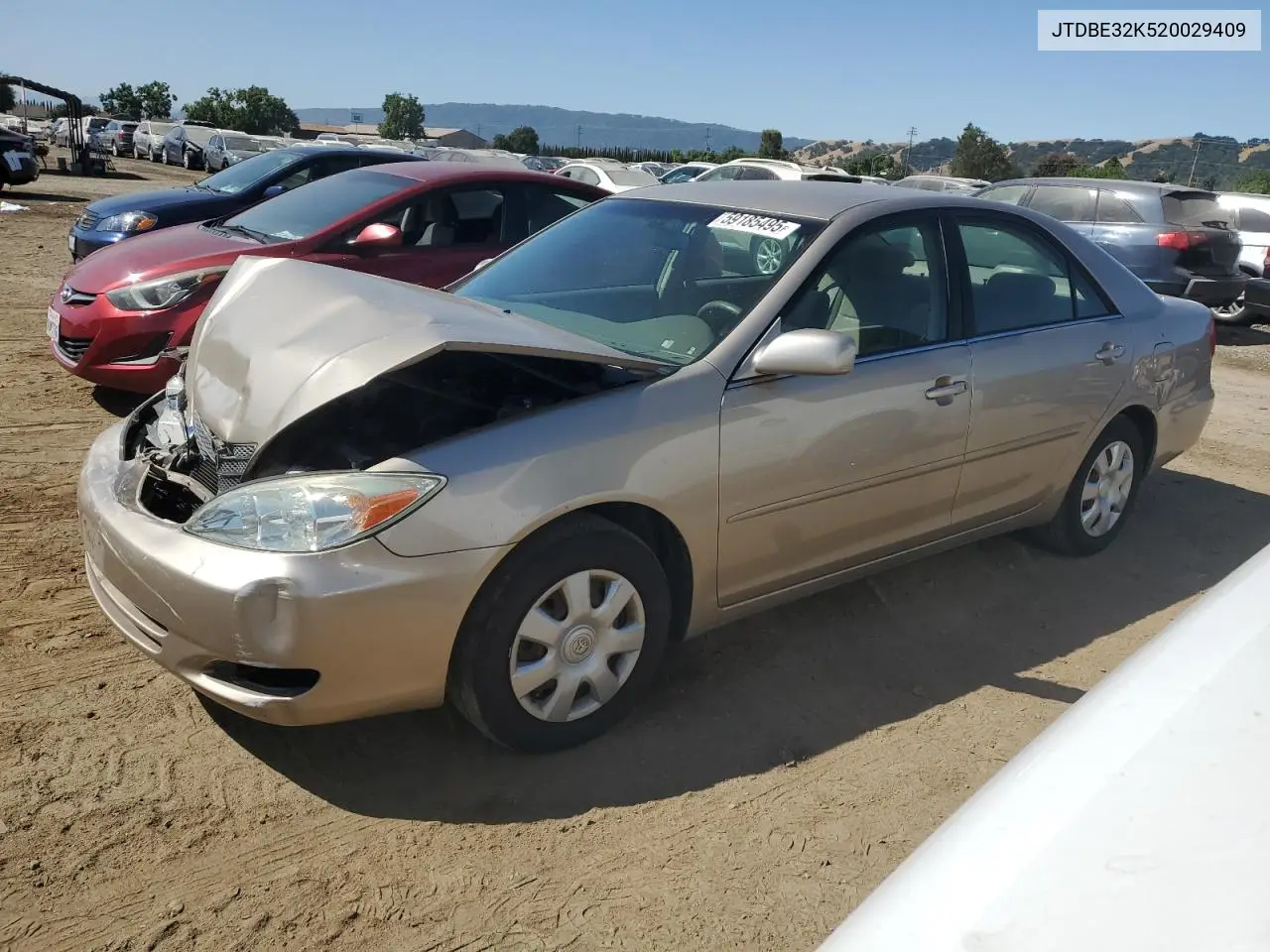 2002 Toyota Camry Le VIN: JTDBE32K520029409 Lot: 59185495